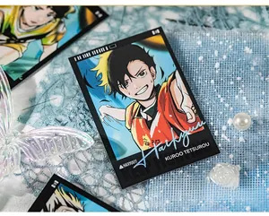 Detail of Haikyuu Kuroo character card with glossy finish on blue mesh texture