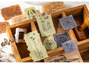 Close-up of vintage textured paper ephemera set with hand-torn edges for DIY scrapbooking