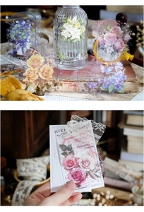 Detail of vintage PET floral stickers featuring roses and butterflies for DIY journaling