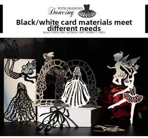 Detailed view of hollowed silhouette paper cutouts for DIY scrapbooking and crafts