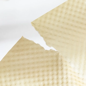 Textured cream hollow mesh paper for journaling with embossed dot pattern and fiber detail