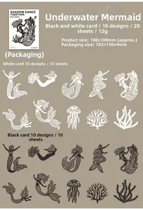 Detail of shadow dance mermaid silhouettes and coral paper cutouts for scrapbooking