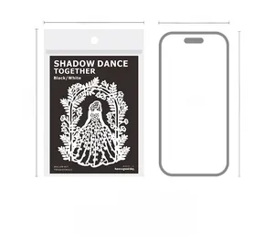 Size comparison of hollow out silhouette paper cards next to an iPhone 15 model
