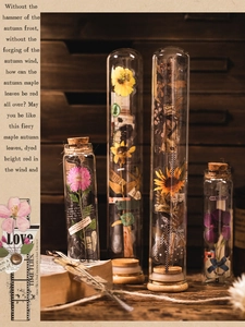 Macro detail of vintage dried flower PET stickers in decorative glass apothecary bottles