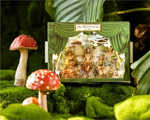 Close-up of Forest Fairy 3D paper carving scene with moss and mushroom decorations