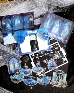 Detail of Swan Lake ballet themed scrapbooking stickers with blue piano and stars