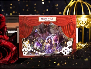 Macro shot of MO·CARD Magic Witch stickers featuring stage curtains and gothic fantasy art
