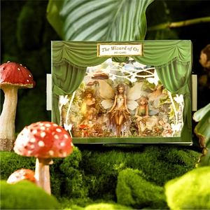 Wizard of Oz themed 3D pop-up card with delicate forest spirits and green curtain design