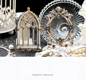 Macro shot of gothic window and baroque oval frame cutouts for DIY scrapbooking decor