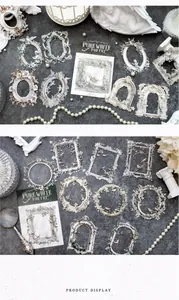 Close-up of Pure White Poetry vintage hollow lace paper with embossed frame designs