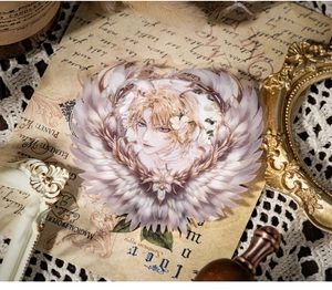 Detail van vintage PET-sticker met gevleugelde mannelijke illustratie voor scrapbooking