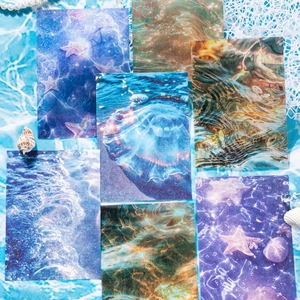 Esthetisch oceaan scrapbooking papier set met kwallen en zeesterren patronen