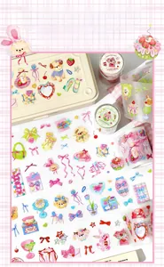 Close-up of glitter PET masking tape with cute dog and strawberry die-cut patterns