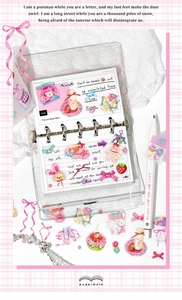 Flat lay of cute aesthetic binder notebook set with cartoon stickers and white pen