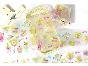 Detailed view of cute PET decorative tape with glitter finish and pastel cartoon motifs