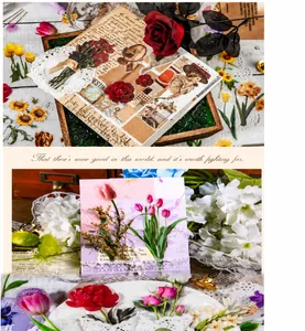 Detailed close-up of retro floral paper stickers and white lace cutouts for DIY journaling