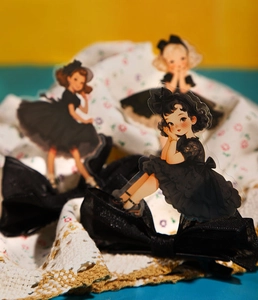 Detail of vintage Lolita girl stickers with black lace dresses for DIY journal scrapbooking