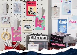 Detail of American vintage style scrapbook kit with stickers and storage basket