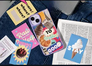 DIY retro collage iPhone case with purple frame on blue denim background with vintage cards