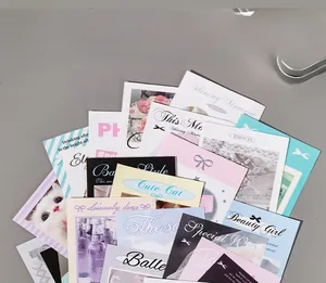 Close-up of vintage aesthetic scrapbook stickers with cute cats and butterflies