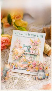Macro shot of Dream Weaving vintage sewing themed PET stickers on lace background