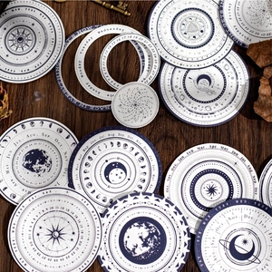 Retro astronomical round planner stickers with moon phases and calendar on wood background