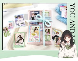 Detailed view of anime-style decorative stickers and cards in soft pastel colors
