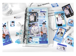 Detail of transparent 6-ring PVC binder with anime stickers and blue themed stationery