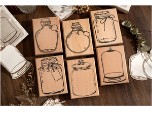 Set of 6 vintage wooden stamps featuring detailed bottle designs for DIY scrapbooking