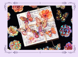 Iridescent orange butterfly and floral stickers with shimmering holographic finish
