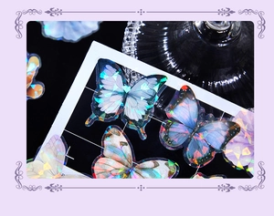 Detailed macro of holographic laser butterfly stickers with iridescent PET material finish