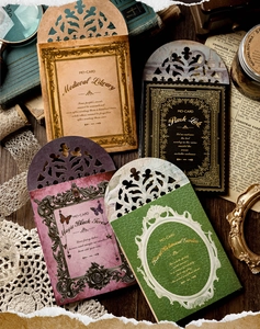 Detailed laser-cut vintage stationery stickers featuring library and botanical themes