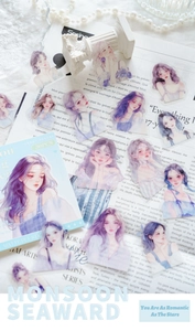 Close-up of matte PET stickers with anime girl illustrations for planner decoration
