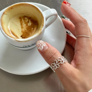 S925 sterling silver hollow daisy open ring with irregular floral design for women