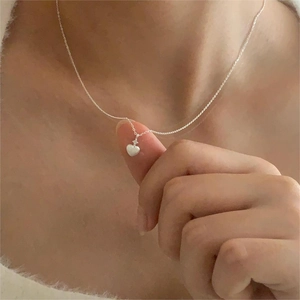 Minimalist 925 sterling silver necklace with a tiny frosted heart pendant on a thin chain