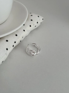 Detailed view of S925 sterling silver multilayer intertwined crossing line open ring