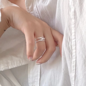 S925 sterling silver multi-layer crossover ring with beads worn on a model finger