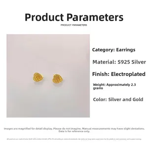 Detail of 925 sterling silver heart earrings with quilted texture and gold plating