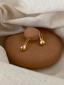Minimalist 925 sterling silver golden teardrop earrings with a polished mirror finish