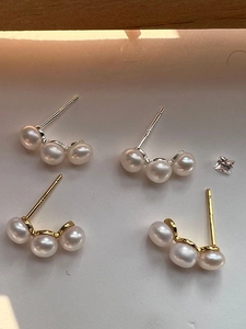 Detail of 925 sterling silver stamp on minimalist pearl stud earrings set