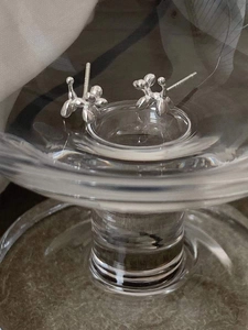 Minimalist silver balloon dog stud earrings in polished sterling silver for women