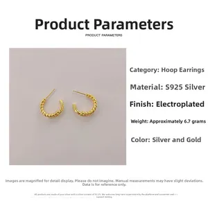 Detailed view of S925 sterling silver twisted C-shape earrings in gold and silver finish
