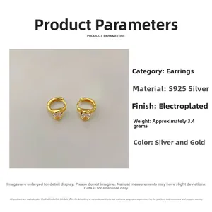 Detailed view of gold S925 sterling silver earrings with inlaid cubic zirconia