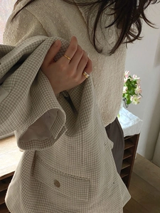 Minimalist gold and silver layered rings for women in a premium Korean fashion style