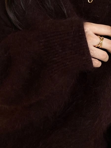 925 sterling silver layered cross textured ring on hand with brown mohair sweater