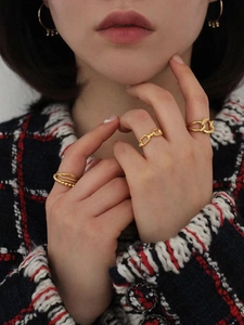 Elegant set of 925 sterling silver gold-plated rings and hoop earrings for women