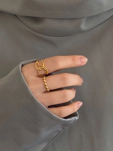 Minimalist 18K gold plated silver ring set with twisted and beaded stackable designs