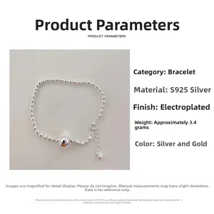 Detailed view of S925 sterling silver ball bracelet with round charm and spring clasp