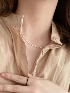Elegant S925 silver beaded necklace and bicolor spiral ring shown on model
