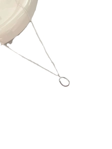 Minimalist 925 sterling silver chain necklace with a small polished oval ring pendant